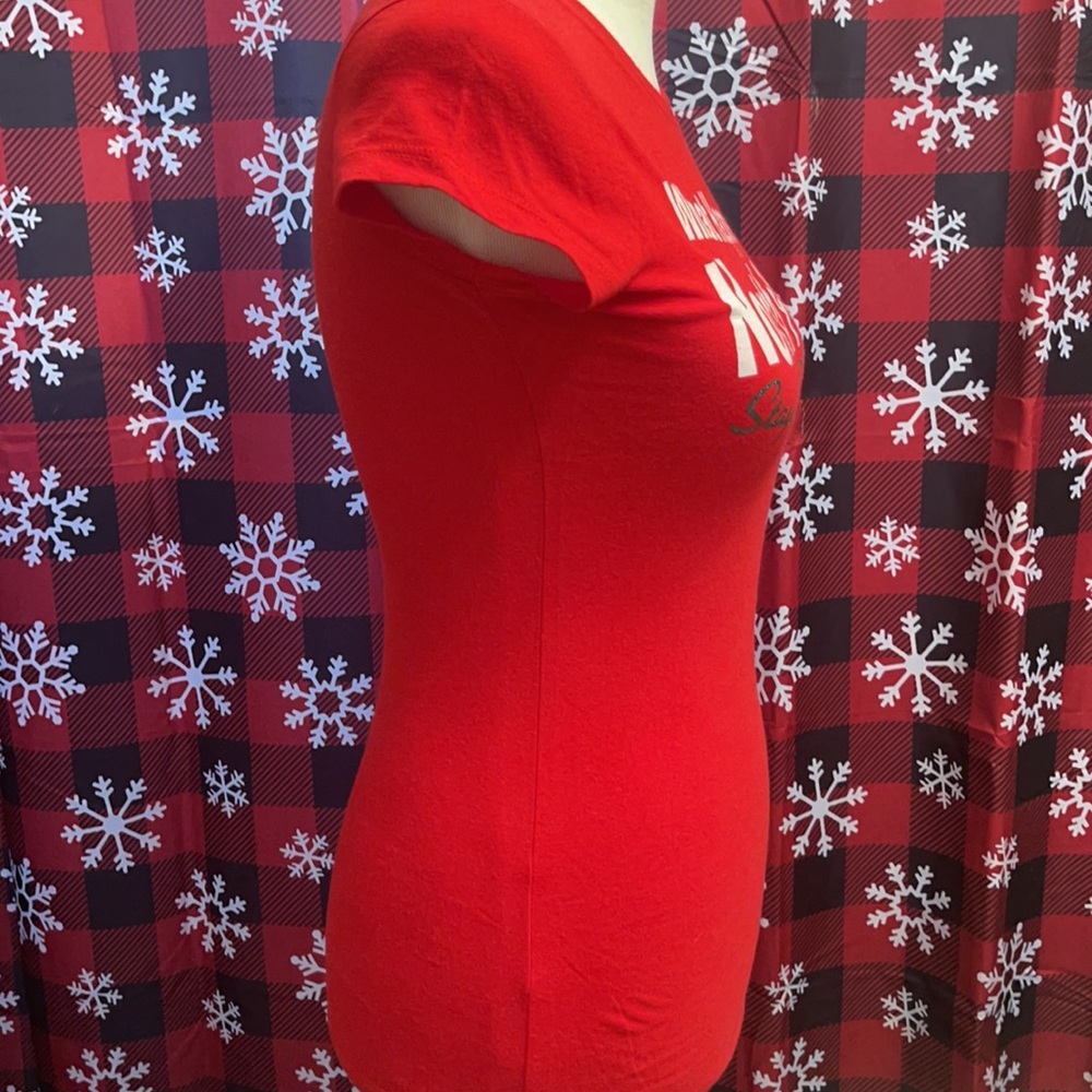 What happens in the North Pole stays in the North Pole Christmas Shirt. Size SM - Picture 4 of 6